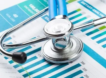 Stethoscope resting on healthcare analytics